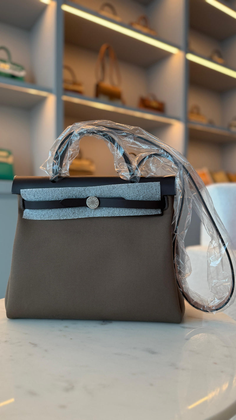 Hermès Retourne Herbag Etoupe Canvas and Ebene Swift Toile Canvas and Swift